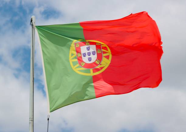 istock Portuguese flag blowing in the wind 1815109270