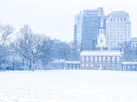 Independence hall in Philadelphia city in winter, covered in snow.