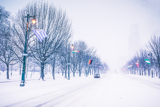 Center city Philadelphia covered in white snow. Winter. Ben Franklin parkway.