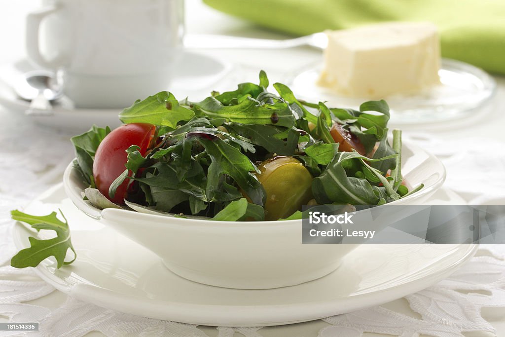 Salada com ruccola e tomates. - Royalty-free Alface Foto de stock