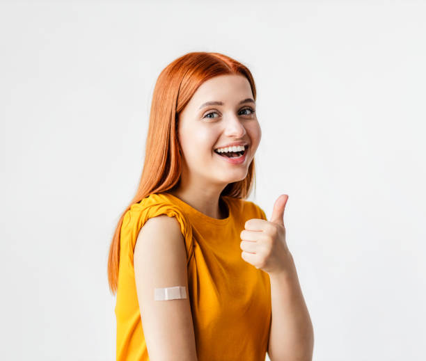 istock Smiling young woman after getting vaccine 1815153331