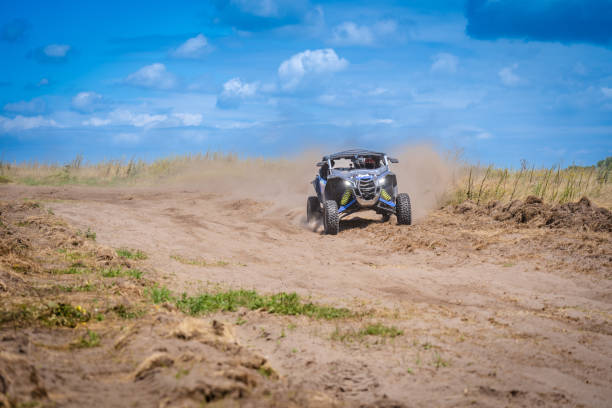 istock UTV in action offroad vehicle racing on sand dune. Extreme, adrenalin. 4x4. 1815157032