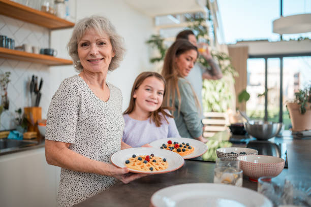 istock Caucasian Family's Waffle Delight with Berry Garnish 1815184232