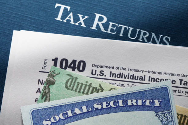 u.s. treasury check social security card and tax return - tax form treasury check tax imagens e fotografias de stock