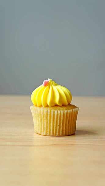 One cupcake on table