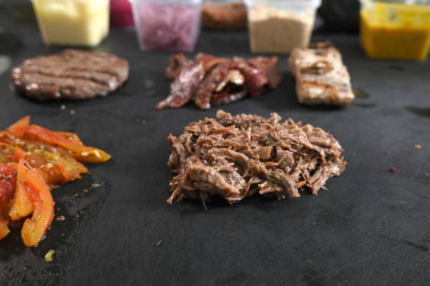 istock food preparation in kitchen, meat vegetables cook 1815220756