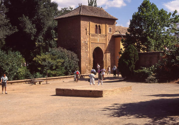 Granada, Spain - aug 19, 1993: view of an entrance door to the Alhambra complex, a fortified palace in Granada, a masterpiece of the Moorish style