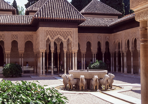 Granada, Spain - aug 19, 1993: view of the basin in the so-called Patio of the Lions, in the Alhambra Palace complex