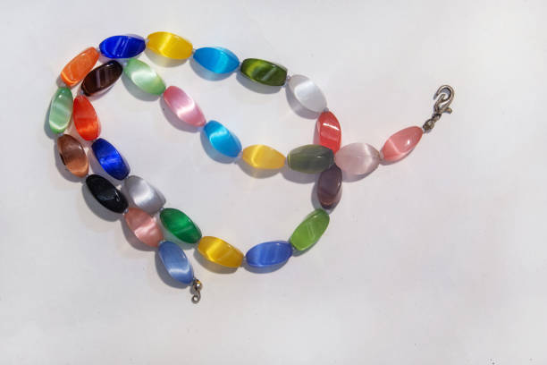 istock Chain of colorful glasses on gray surface 1815249891