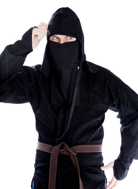 istock caucasian man disguised as a ninja isolated on white 181526017