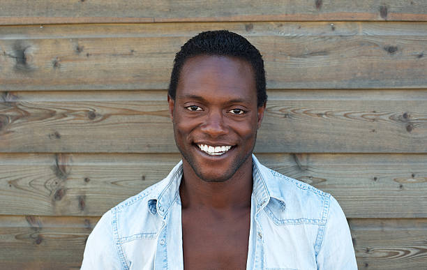 istock Portrait of an attractive black man smiling 181527537