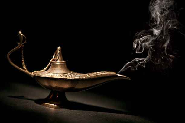 Magical Geni Lamp with Smoke and black background stock photo