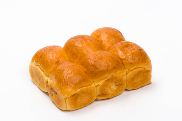 istock Close-up image of six  freshly baked burger buns,  isolated on white background 1815293542