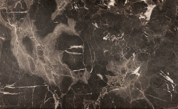 Black marble pattern, natural stone texture with white fibers.