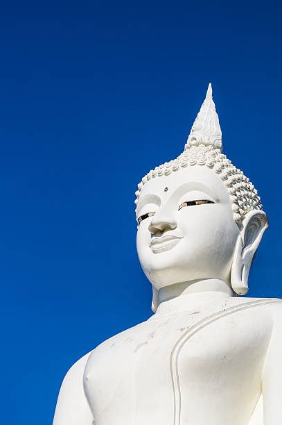 istock Buddha statue with clear blue sky background,Thailand 181538615