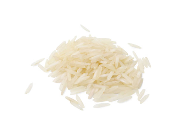 istock Pile of raw rice isolated on white 1815388202
