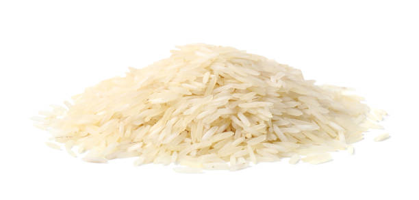 istock Pile of raw rice isolated on white 1815388208