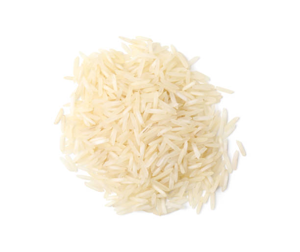 istock Pile of raw rice isolated on white, top view 1815388743