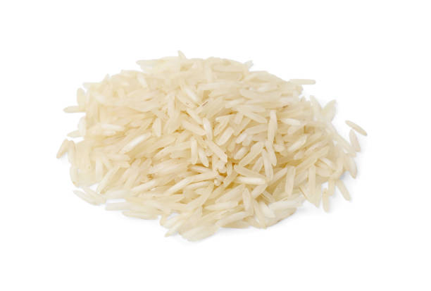 istock Pile of raw rice isolated on white 1815390917