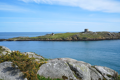 Ireland, rocky coastline and Dalkey Island with Martello tower