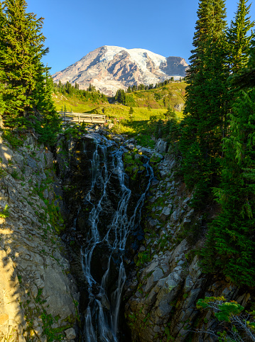 Landscape photograph of Myrtle Falls with Mount Rainier in the background.