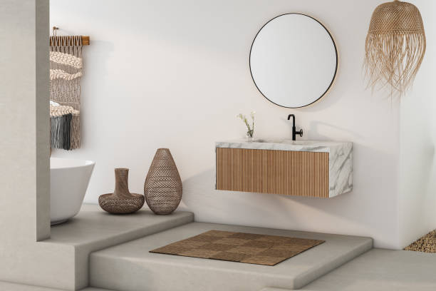 istock Modern minimalist bathroom interior, modern bathroom cabinet, marble basin, wooden vanity, interior plants, bathroom accessories, white walls, concrete floor. 1815416995
