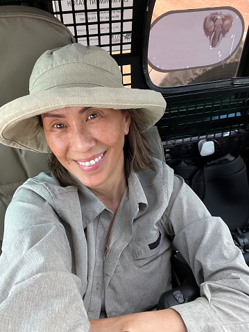 Sitting in the back of a Landcruiser while on safari in Africa