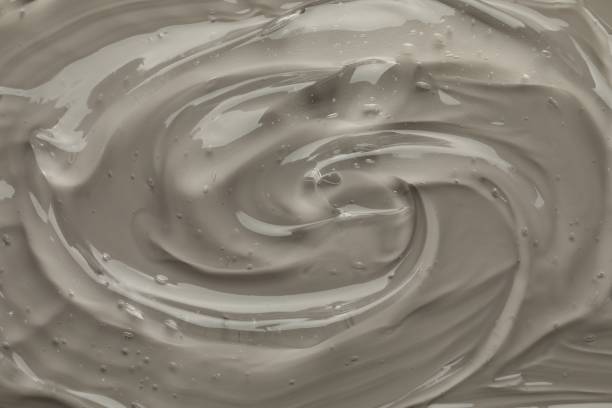 istock Clear cosmetic gel on grey background, top view 1815453760