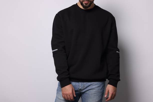 istock Man in stylish sweater on white background, closeup 1815470522