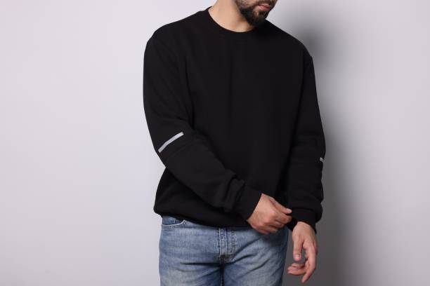 istock Man in stylish sweater on white background, closeup 1815470526