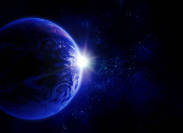 istock earth against the sun in space 181547299