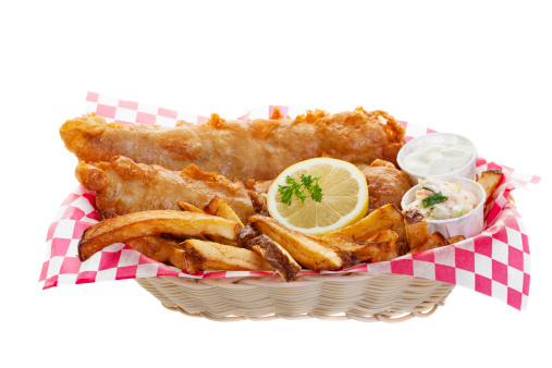 Traditional fish and chips on a white background.