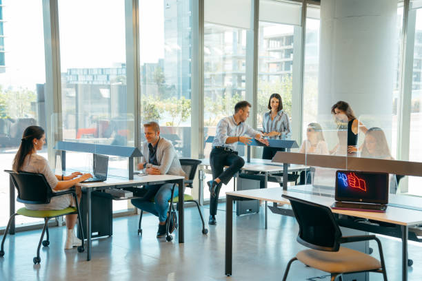 istock Teamwork in Action: Business Professionals Engaged in Project Preparation 1815513535