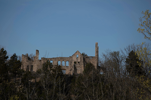 Amidst the leafless trees of Ha Ha Tonka State Park, the remnants of a majestic structure rise, its weathered walls and empty windows a canvas for the imagination. This historic edifice whispers tales of the past, allowing visitors to wander through time amidst its towering presence.