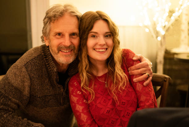 istock Smiling father and blond daughter in 20's 1815518608