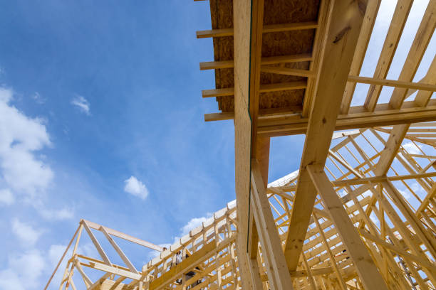 istock Wooden beam stick frames were constructed from trusses beams during construction at new a home 1815549330