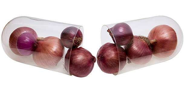 gélule à l'oignon - onionskin photos et images de collection