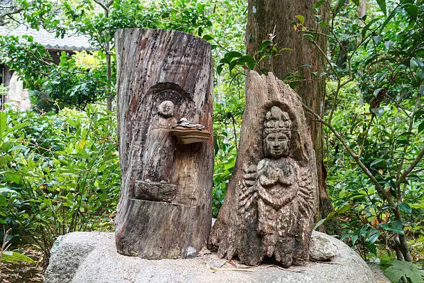 Carving Kun yin and Jizo. Carved from wood.