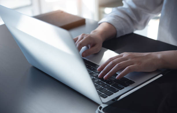 istock Close up, woman hands typing on laptop computer keyboard, surfing the internet on office table, online, working, business and technology, internet networking, telecommuting concept 1815746100