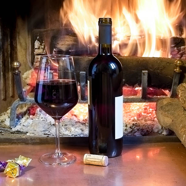 istock wine glass  in front of  fireplace 181577999
