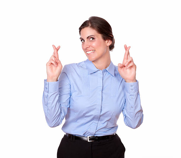 istock Charming gorgeous woman crossing her fingers 181581086