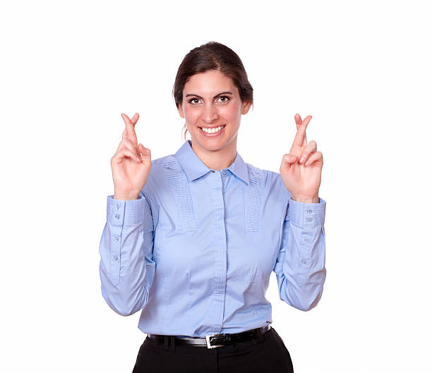 istock Cute lady standing with luck sign 181581205