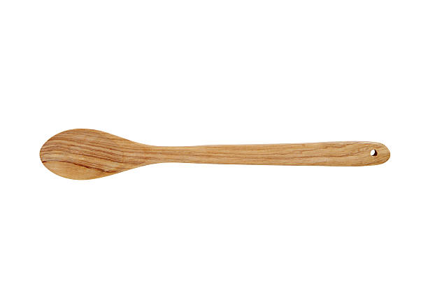 istock New wooden spoon isolated on a white 181581512