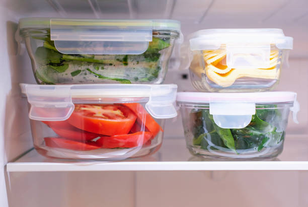 istock Vegetables in glass boxes in the refrigerator close-up. 1815817146