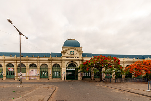 Front view of Maputo, the capital of Mozambique, colonial time built central market before opening hours