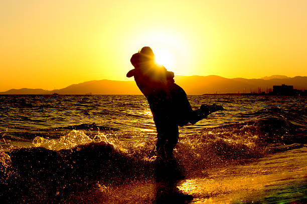 Couple in front of sunset