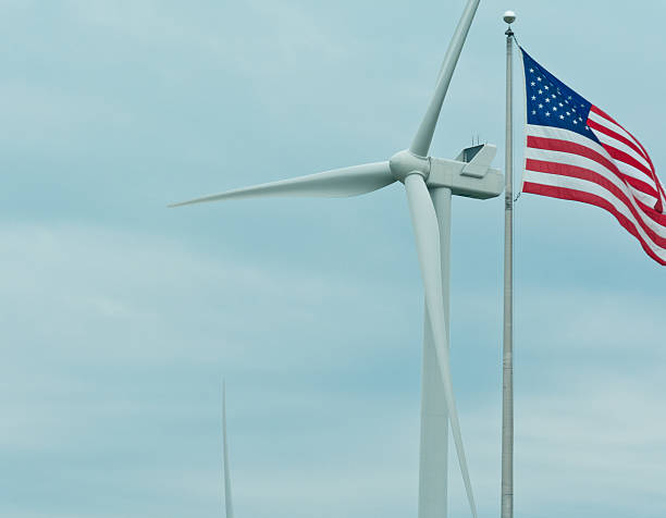 istock United States flag with wind turbine 181585249