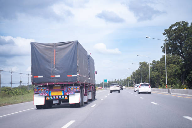 istock Truck on highway road, sky background, cargo transportation concept 1815880821