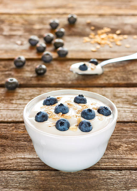 istock Healthy breakfast - yogurt with oat flakes and blueberries 181592526
