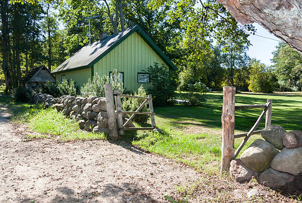 istock House with cobble stone fence 181593118